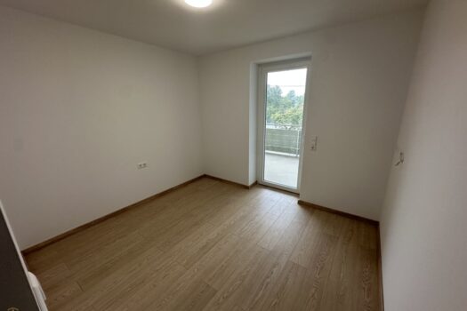 Schlafbereich mit Zugang zum Balkon