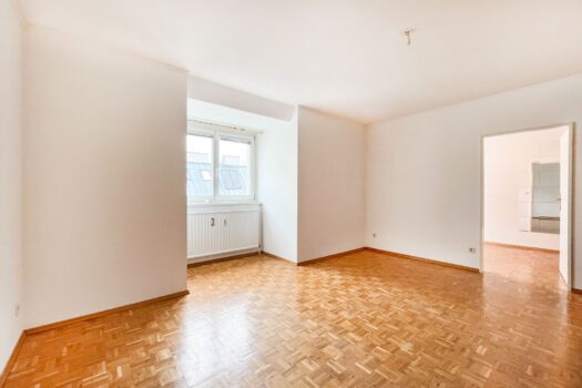 Gut vermietbare DG-Wohnung nahe Hütteldorfer Straße mit Parkplatz Wohnzimmer