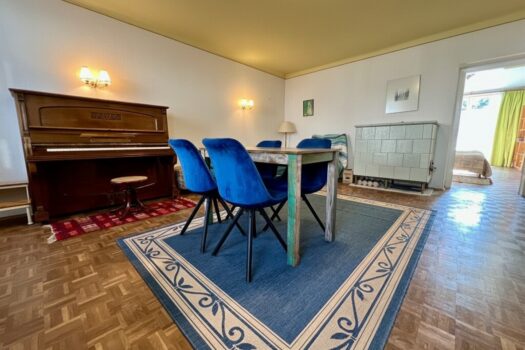 Wintertraum in Döbling: 2-Zimmer-Wohnung mit traditionellem Kachelofen Wohnzimmer