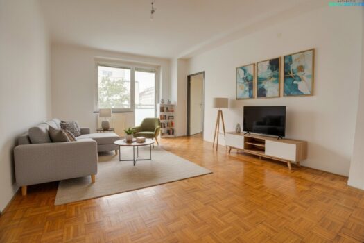 Teilsanierte 2-Zimmer-Neubauwohnung mit Loggia in Toplage Wohnzimmer-Rendering