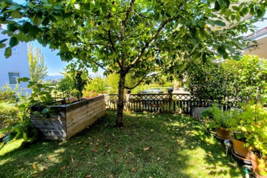 Familienidylle in Toplage – Gartenwohnung mit Terrasse & Tiefgarage Garten